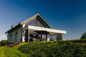 Kalwa Lake House - dom nad jeziorem z prywatnym pomostem i jacuzzi oraz sprzętem wodnym Pasym